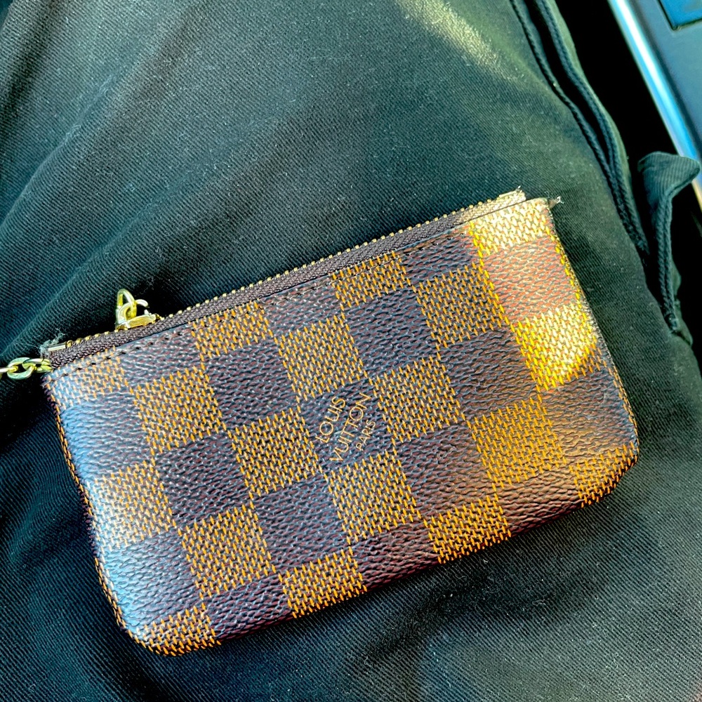 Louis Vuitton coin purse.